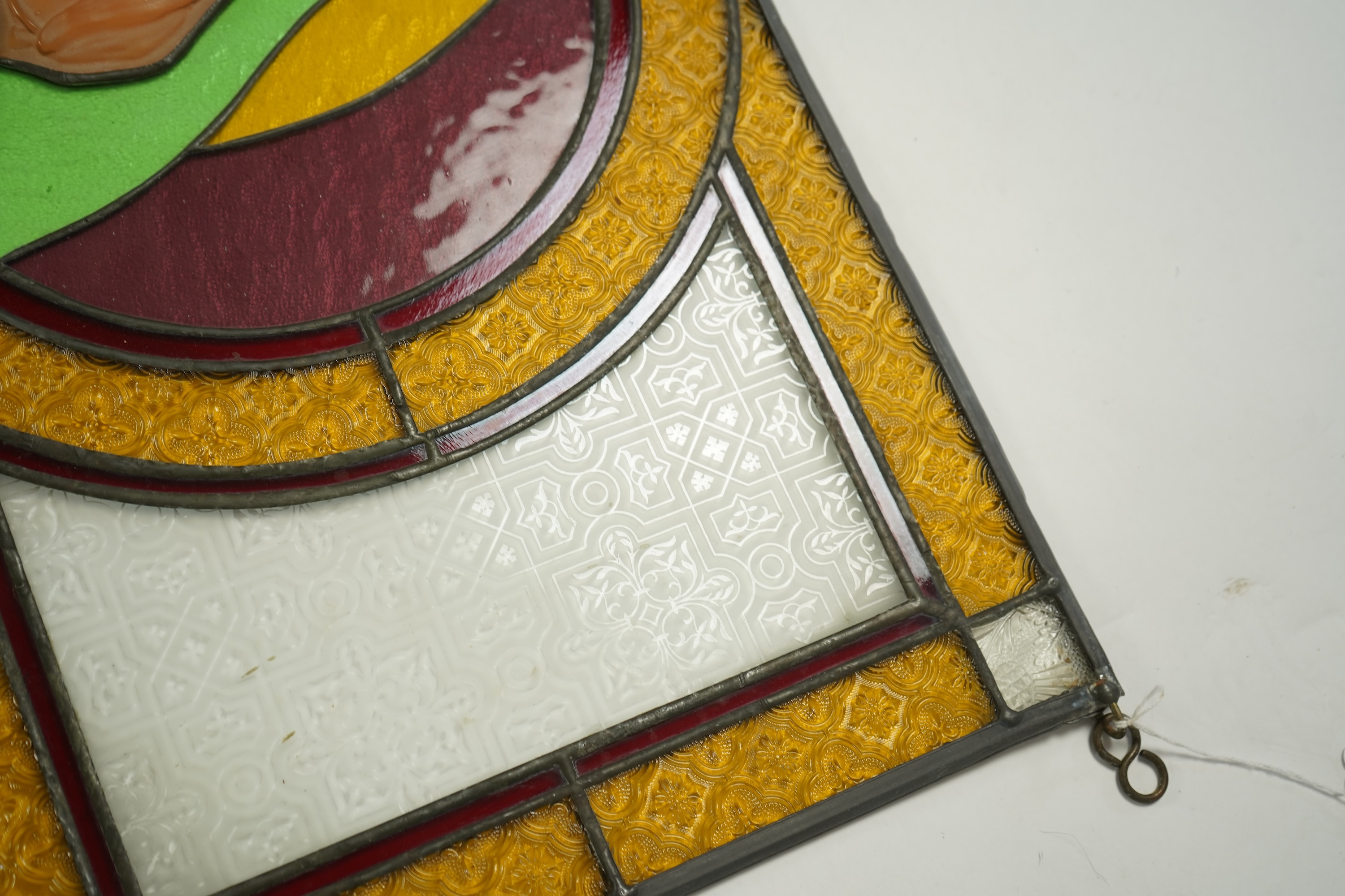 A pair of 20th century stained glass panels